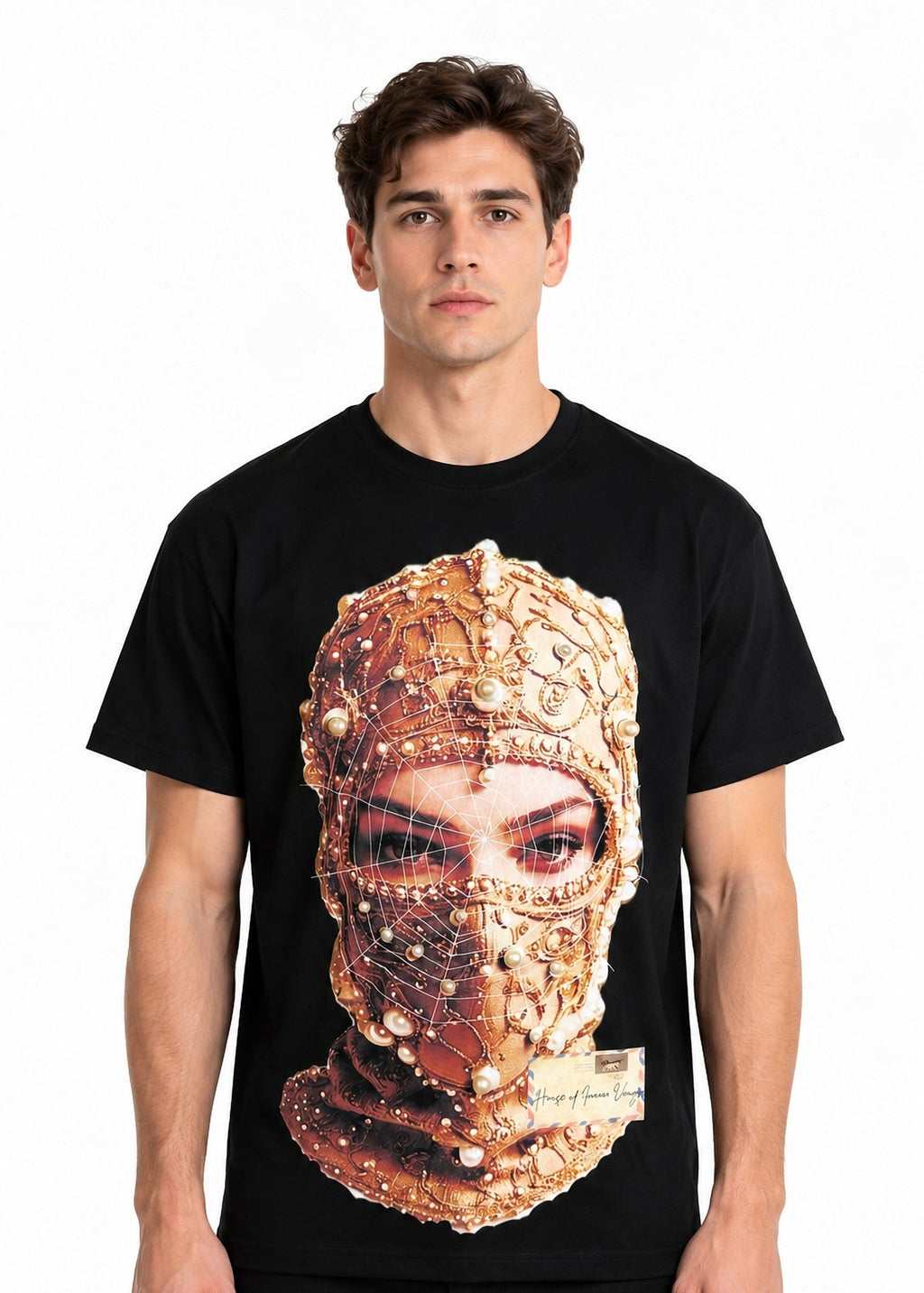 Model wearing the Imaan Vouge Adorned T-Shirt in black with hand-set pearl graphic, front view