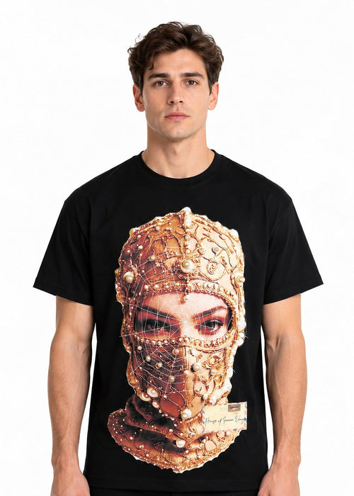 Model wearing the Imaan Vouge Adorned T-Shirt in black with hand-set pearl graphic, front view