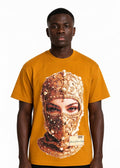 Model wearing the Imaan Vouge Adorned T-Shirt in coffee brown with hand-set pearl graphic, front view